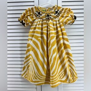 Le’za me size 24M smocked saints dress Yellow white and black fleur de lis
